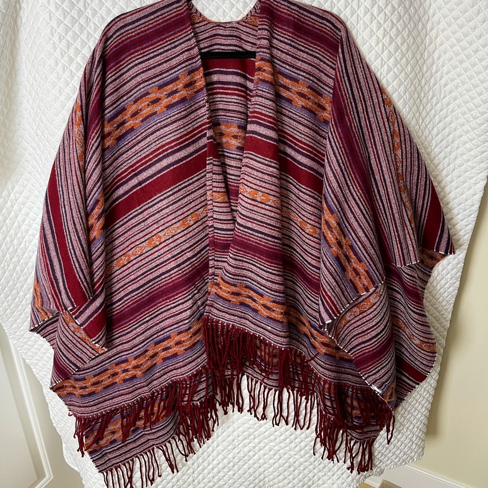 SOFT Never worn poncho. Deep maroon, burnt orange, & subtle periwinkle stripes